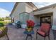 Relaxing patio with seating area and potted poinsettia at 8062 E Cortez Dr, Scottsdale, AZ 85260