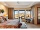 Main bedroom with large windows offering scenic mountain views at 9784 E Miramonte Dr, Scottsdale, AZ 85262