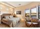 Bright bedroom with a comfortable bed and mountain views at 9784 E Miramonte Dr, Scottsdale, AZ 85262