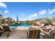 Relaxing pool area with lounge chairs and fire pit at 9784 E Miramonte Dr, Scottsdale, AZ 85262