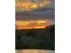 Amazing sunset reflecting on the water with desert views at 9784 E Miramonte Dr, Scottsdale, AZ 85262
