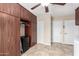 Laundry room with built-in cabinets and extra storage at 12715 W Beechwood Dr, Sun City West, AZ 85375