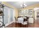 Cozy dining area with a round table and built-in hutch at 5502 E Baywood Ave, Mesa, AZ 85206
