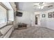 Bedroom features a window seat, built in drawers and ceiling fan at 8885 E Voltaire Dr, Scottsdale, AZ 85260