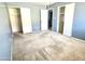 Bright bedroom with neutral walls and carpet flooring at 1230 N 84Th Pl, Scottsdale, AZ 85257