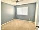 Spacious bedroom with neutral walls, carpet, and window coverings at 1230 N 84Th Pl, Scottsdale, AZ 85257
