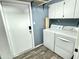 Laundry room with washer, dryer, cabinets, and tiled floor at 1230 N 84Th Pl, Scottsdale, AZ 85257