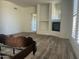 Spacious bedroom with fireplace and access to private patio at 12646 N 17Th Pl, Phoenix, AZ 85022