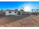 A house with solar panels and a gravel yard at 142 W Ivanhoe Pl, Chandler, AZ 85225