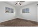 Bedroom featuring neutral walls, carpet, and windows at 142 W Ivanhoe Pl, Chandler, AZ 85225