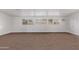 Large living room filled with natural light and neutral carpeting at 142 W Ivanhoe Pl, Chandler, AZ 85225