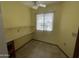 A sunny, inviting eat-in kitchen featuring a window and a ceiling fan at 11012 W Thunderbird W Blvd, Sun City, AZ 85351