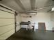 Organized garage space with workbench and storage solutions at 11012 W Thunderbird W Blvd, Sun City, AZ 85351