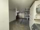 Spacious garage featuring ample storage cabinets and access to shelving on the back wall at 11012 W Thunderbird W Blvd, Sun City, AZ 85351