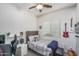 Cozy bedroom with a comfortable bed, stylish decor, and ample space for relaxation at 15312 S 181St Dr, Goodyear, AZ 85338