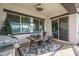 Charming patio space featuring a dining table, grill, and seamless indoor-outdoor flow at 15312 S 181St Dr, Goodyear, AZ 85338
