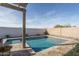 Sparkling pool and spa, surrounded by patio perfect for soaking up the sun and relaxing at 15312 S 181St Dr, Goodyear, AZ 85338