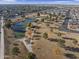 Aerial view of a park with a pond and walking paths at 4047 E Catalina Cir, Mesa, AZ 85206