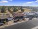 House nestled in a community, near a pond and golf course at 4047 E Catalina Cir, Mesa, AZ 85206
