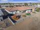 Landscaped backyard with patio, artificial turf, and seating area at 4047 E Catalina Cir, Mesa, AZ 85206