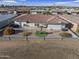 Spacious backyard with patio, artificial grass, and a seating area at 4047 E Catalina Cir, Mesa, AZ 85206