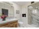 Bathroom with marble shower and updated vanity at 4047 E Catalina Cir, Mesa, AZ 85206