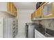 Laundry room with washer, dryer, and extra storage at 4047 E Catalina Cir, Mesa, AZ 85206