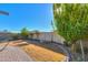 Landscaped backyard with a curved pathway at 4901 W Crocus Dr, Glendale, AZ 85306