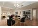 Bright dining area with wood floors and modern furnishings at 10214 E Michigan Ave, Sun Lakes, AZ 85248
