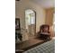 Main bedroom with ensuite bathroom access and ceiling fan at 17475 W Caribbean Ln, Surprise, AZ 85388
