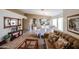 Open dining area with a tiled floor and a view to kitchen at 17475 W Caribbean Ln, Surprise, AZ 85388