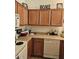 Kitchen with ample counter space and wood cabinetry at 17475 W Caribbean Ln, Surprise, AZ 85388