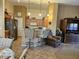 Kitchen with breakfast bar, stainless steel appliances, and wood cabinets at 17475 W Caribbean Ln, Surprise, AZ 85388