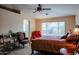 Comfortable main bedroom with ensuite bathroom access at 17475 W Caribbean Ln, Surprise, AZ 85388