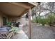 Relaxing covered patio with outdoor furniture at 17475 W Caribbean Ln, Surprise, AZ 85388