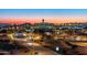 Nighttime aerial view of the city with highway and airport at 602 E Taylor St, Tempe, AZ 85288