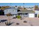 Two-story home with gray exterior and small front yard at 602 E Taylor St, Tempe, AZ 85288