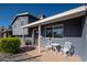 House exterior, gray siding, white chairs on porch at 602 E Taylor St, Tempe, AZ 85288