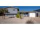 Front view of gray house with white garage door at 602 E Taylor St, Tempe, AZ 85288