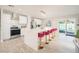 Modern kitchen featuring a large island, stainless steel appliances, and white cabinetry at 602 E Taylor St, Tempe, AZ 85288