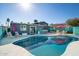 Relaxing pool area with patio furniture and a turquoise pool at 602 E Taylor St, Tempe, AZ 85288