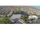 Community overview: houses, golf course, lake, and clubhouse at 9048 E Cedar Waxwing Dr, Sun Lakes, AZ 85248