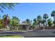 Gated entrance to the community with an American flag at 9048 E Cedar Waxwing Dr, Sun Lakes, AZ 85248
