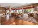 Comfortable Gathering room with hardwood floors, access to backyard, and ample natural light at 9048 E Cedar Waxwing Dr, Sun Lakes, AZ 85248