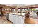 Island kitchen with granite countertops and stainless steel appliances at 9048 E Cedar Waxwing Dr, Sun Lakes, AZ 85248