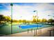 Expansive tennis courts perfect for a game at 9048 E Cedar Waxwing Dr, Sun Lakes, AZ 85248