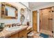 Bathroom with single sink and walk-in shower at 9250 E Whitethorn Cir, Scottsdale, AZ 85266
