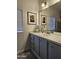 Bathroom with double vanity and updated fixtures at 9302 E Broadway Rd # 184, Mesa, AZ 85208