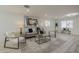 Bright living room with modern furnishings and contemporary artwork at 1323 W Tuckey Ln, Phoenix, AZ 85013