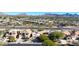 Aerial view of house and community with mountain backdrop at 23635 N 75Th Pl, Scottsdale, AZ 85255